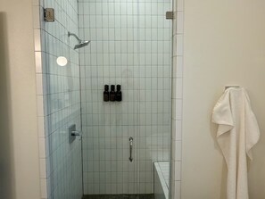 Shower, eco-friendly toiletries, hair dryer, towels