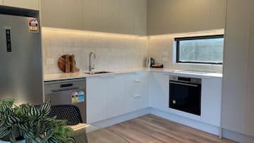 Superior Apartment | Private kitchen | Full-sized fridge, microwave, oven, stovetop