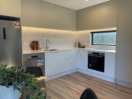 Superior Apartment | Private kitchen | Full-size fridge, microwave, oven, stovetop