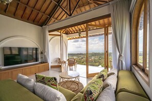 Deluxe-Studio, Balkon, Meerblick | Wohnbereich