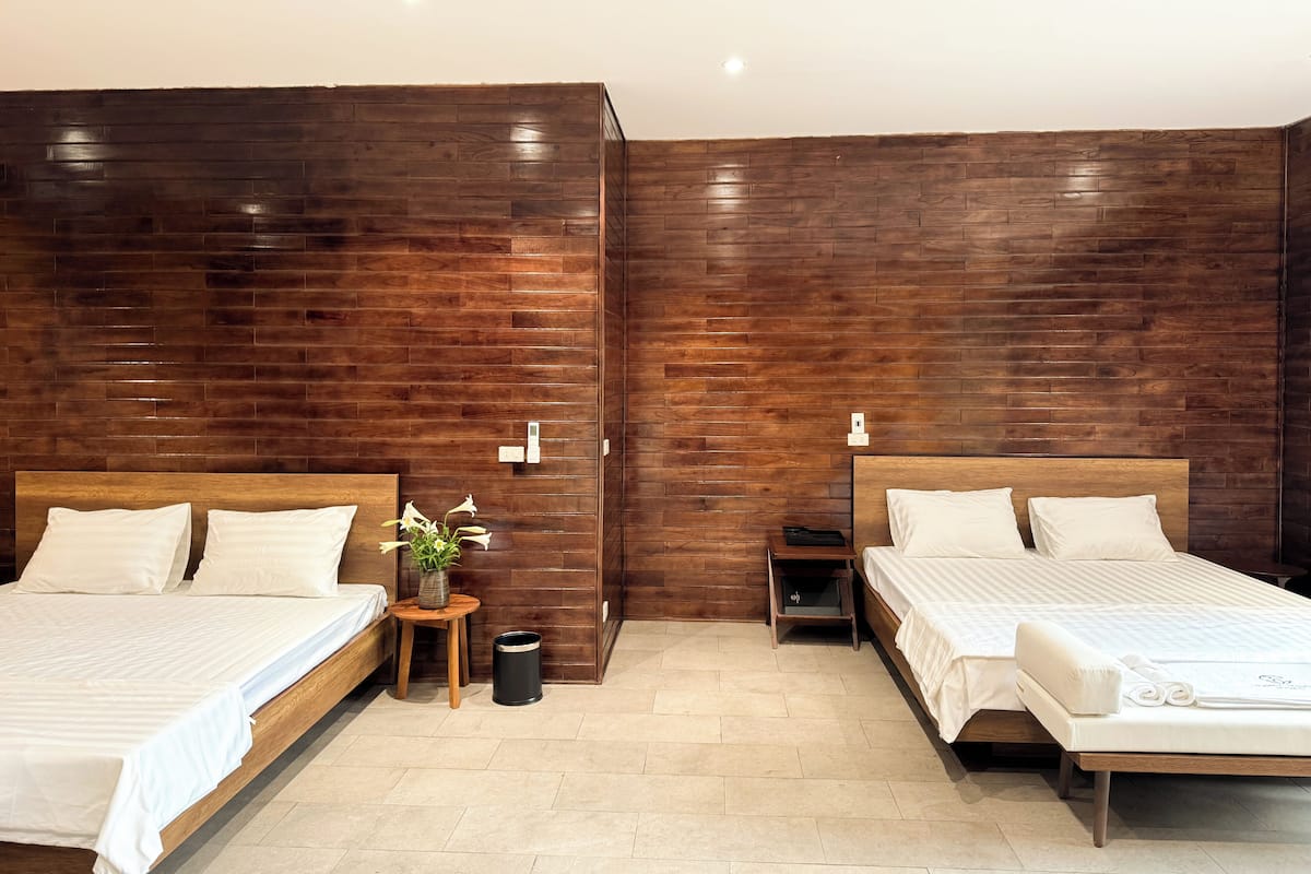 Deluxe Quadruple Room, Mountain View | In-room safe, laptop workspace, iron/ironing board, free WiFi