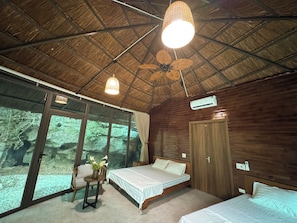 Deluxe Bungalow, Balcony, Garden View | In-room safe, laptop workspace, iron/ironing board, free WiFi