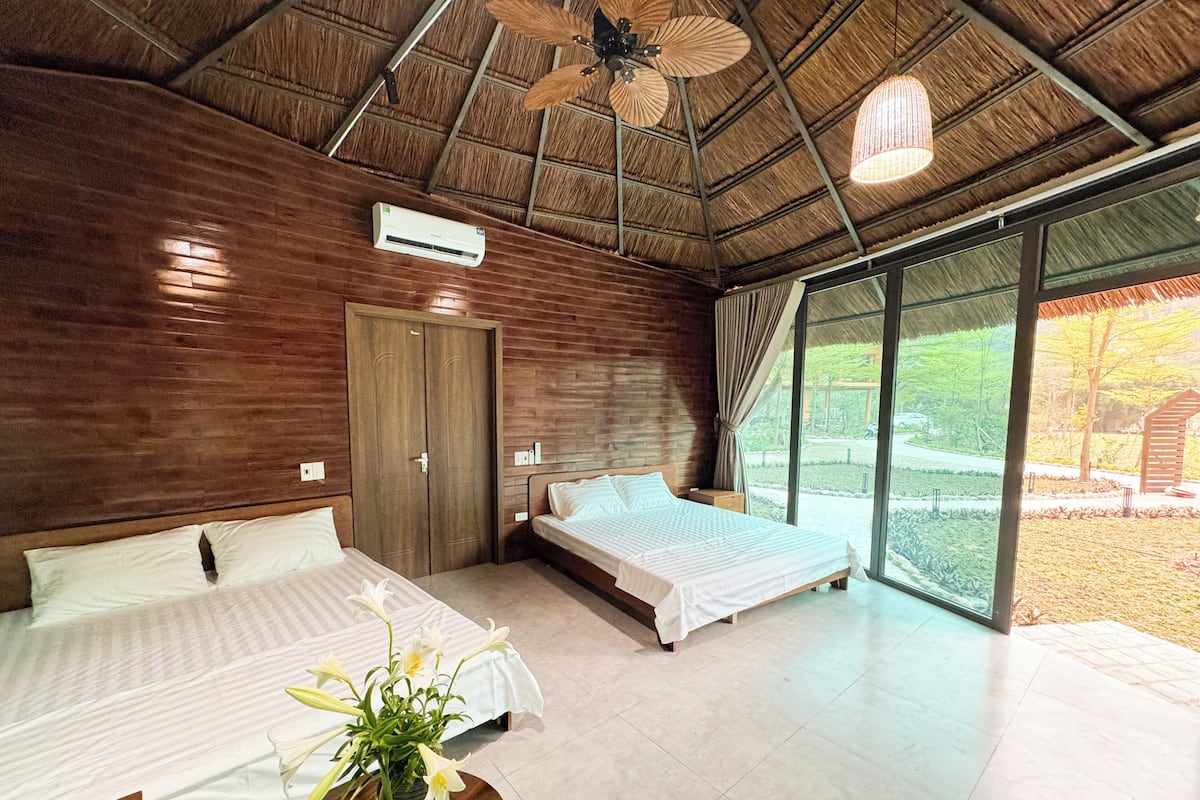 Deluxe Bungalow, Balcony, Garden View | In-room safe, laptop workspace, iron/ironing board, free WiFi