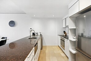 Appartement | Cuisine privée | Lave-vaisselle, vaisselle et ustensiles