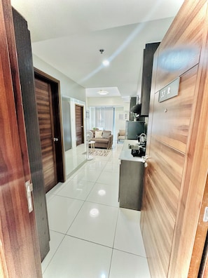 Deluxe Condo, Balcony, City View | Living area