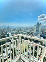 Deluxe Condo, Balcony, City View | Balcony