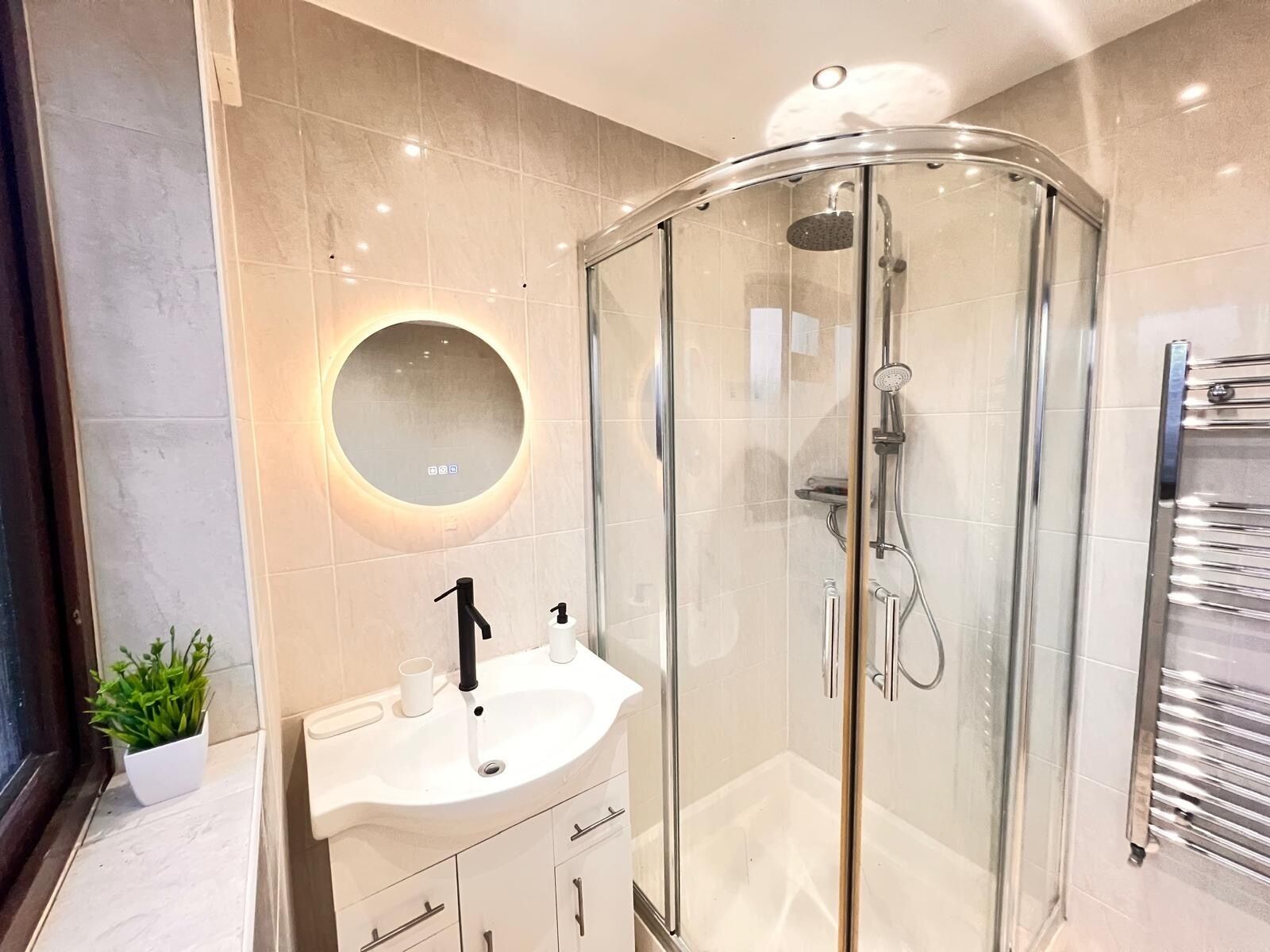 Shower, towels, soap, toilet paper