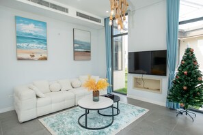 Villa Deluxe, 2 chambres, vue océan, en front de plage | Coin séjour