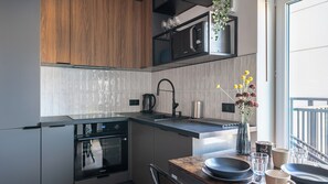 Appartement (60) | Cuisine privée | Réfrigérateur, plaque de cuisson, bouilloire électrique