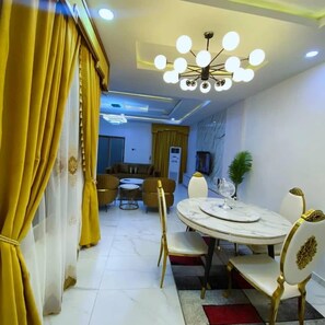 Luxury Apartment, Balcony, City View | In-room dining