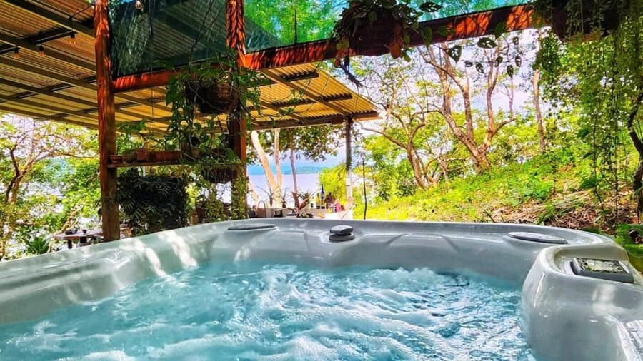 Teak House in a Forest Above the Beach