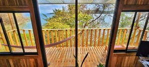 House, 1 Bedroom, Smoking, Balcony | Balcony - Teak House in a Forest Above the Beach (Lepanto)