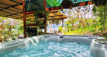 Teak House in a Forest Above the Beach