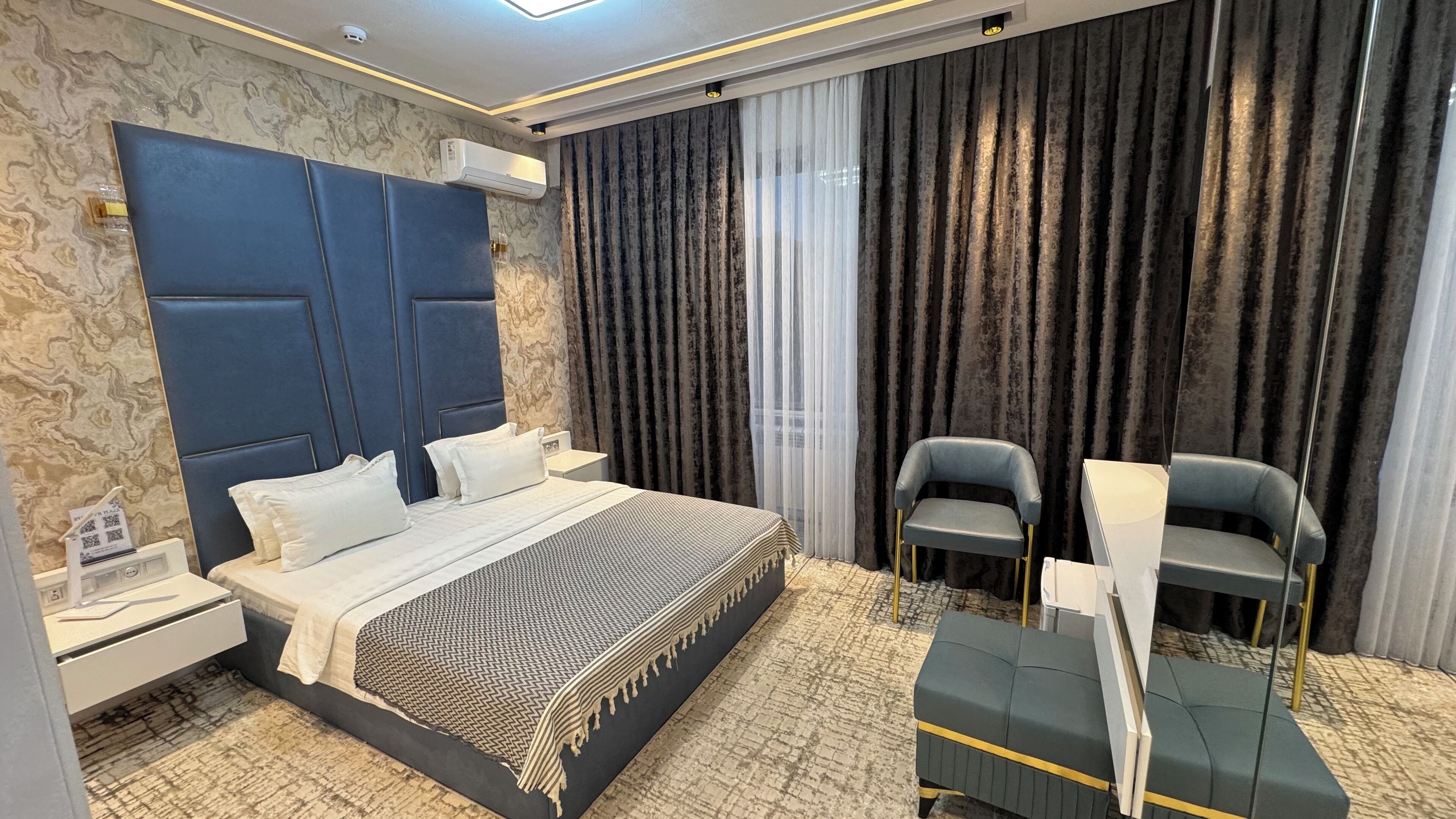 Deluxe-Doppelzimmer zur Einzelnutzung, Stadtblick | Wohnbereich