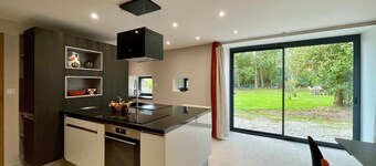 Les Vikings" country house in a green setting.