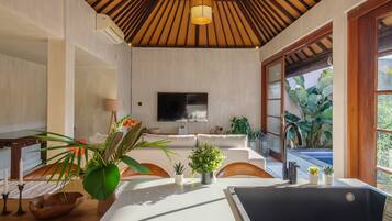 Deluxe Villa | Living area | 42-inch LCD TV with digital channels