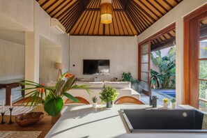 Deluxe Villa | Living area | 42-inch LCD TV with digital channels - Madeira Casa Canggu Bali (Canggu)