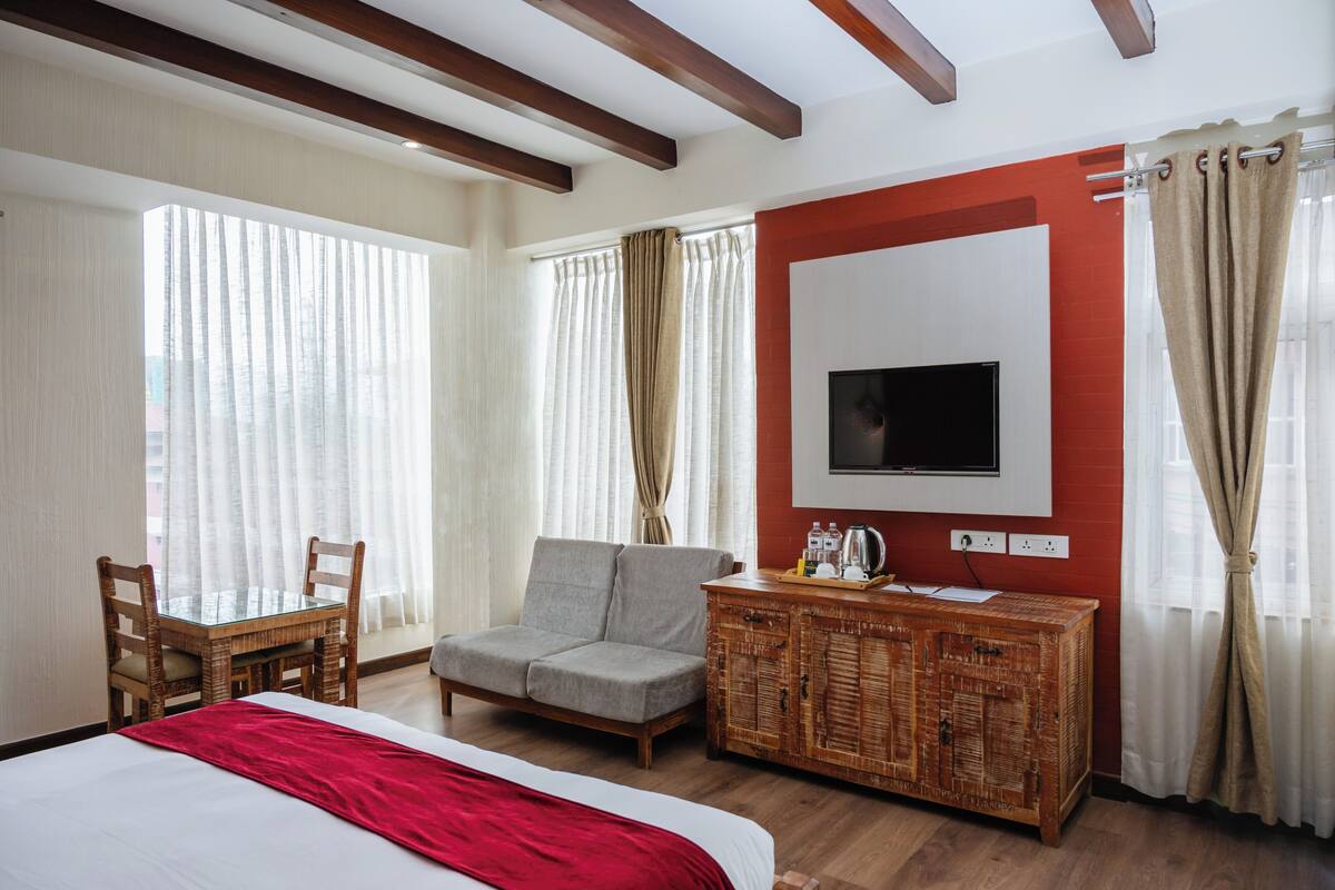 Deluxe Double Room Single Use, City View | In-room safe, desk, laptop workspace, blackout drapes