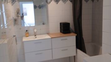 Hair dryer, towels, toilet paper