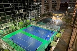 An outdoor basketball court surrounded by high-rise buildings. - Emgrace/Near AeonTebrau/ IKEA Toppen /MountAustin (Johor Bahru)