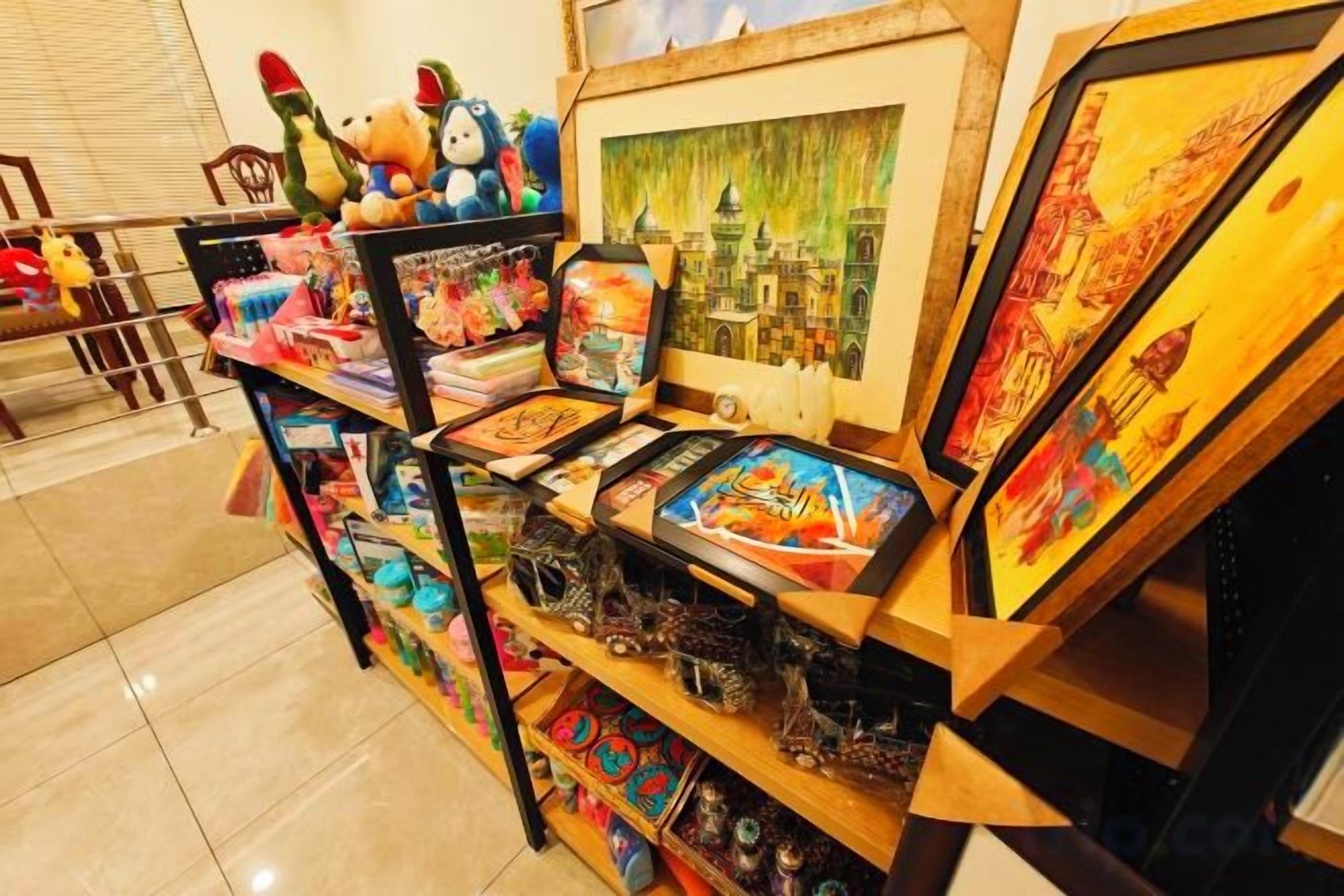 A display of various toys and collectibles on shelves.