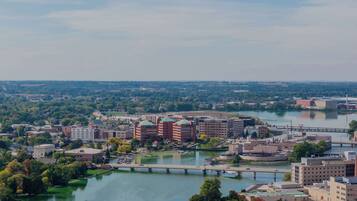 A cityscape with a river, bridges, and buildings.