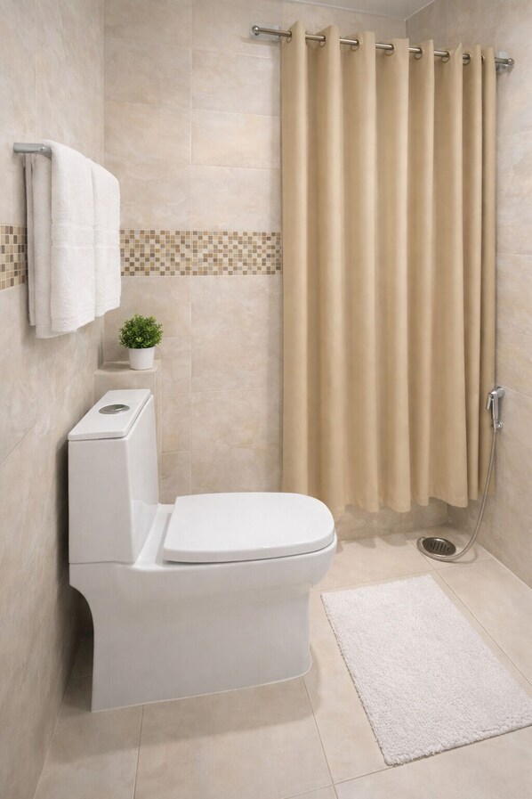 A modern bathroom with a toilet, shower, and a beige curtain. - Wall Street by Rivlet (New Delhi)