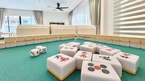 A room with a green carpet, a ceiling fan, and a window with curtains. - HH Villa Private Pool Bercham (Ipoh)