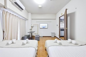 A hotel room with two beds, a desk, a chair, a TV, and a wardrobe. - RS Namba, Dotonbori, Shinsaibashi Amemera (Osaka)