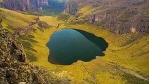 A valley with a lake surrounded by cliffs. - Blue Zone Kenya Resorts and Game Drives (Nanyuki)