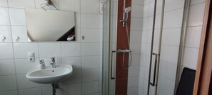 Shower, free toiletries, hair dryer, towels