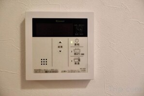 A control panel with buttons and indicators, likely for room temperature and lighting control. - Peace House｜4 Bedrooms, 5 Bathrooms, 5 Toilets, Parking & Terrace (Osaka)