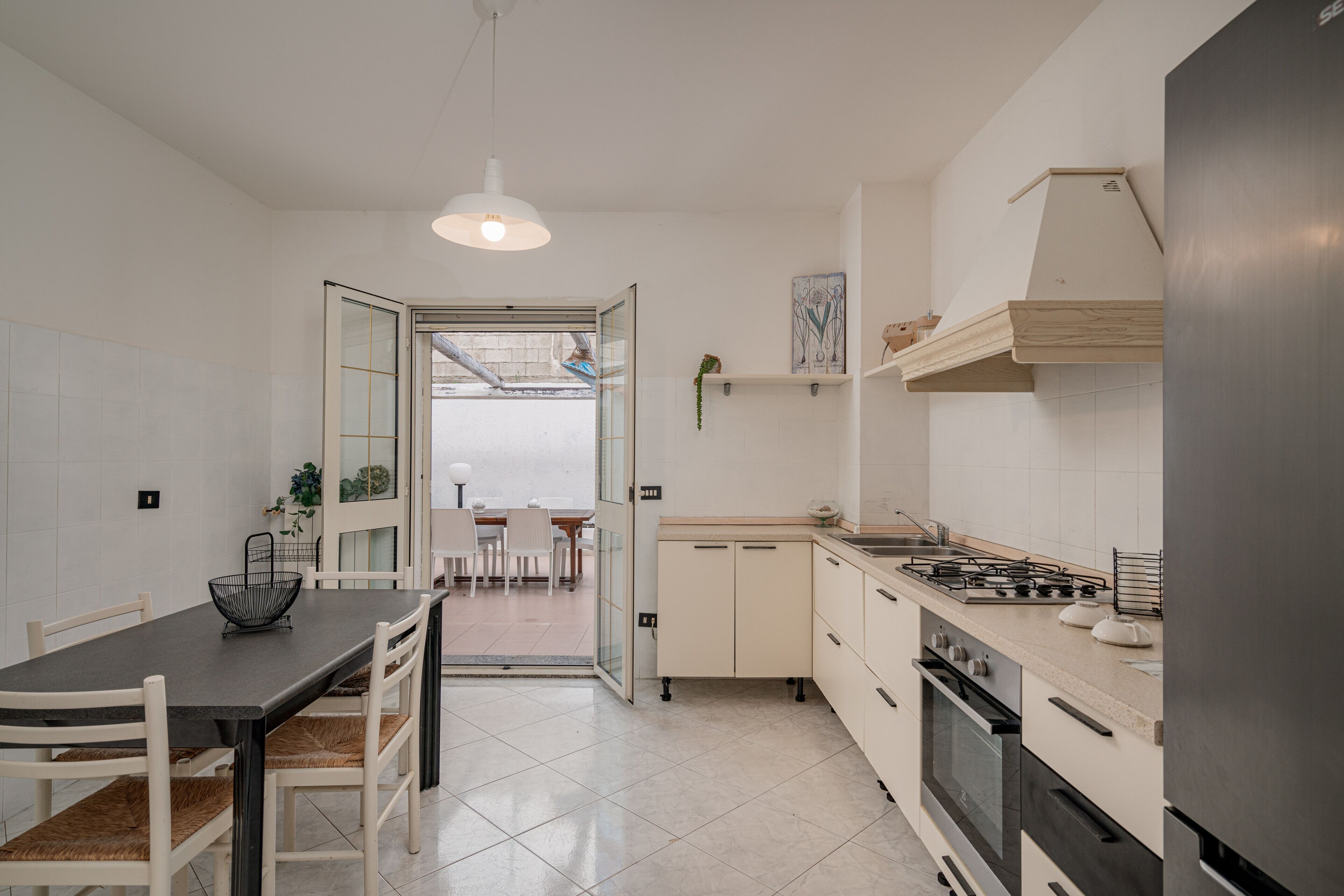 Apartamento, 3 quartos | Cozinha privada | Geladeira, fogão, cooktop, máquina de café expresso