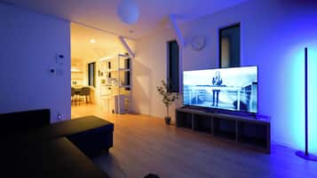 Family Villa, 3 Bedrooms, Balcony, City View | Living area | 50-inch Smart TV with digital channels, Netflix, Hulu