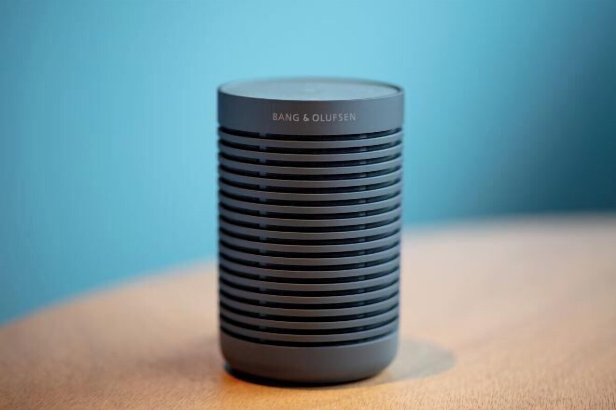 A cylindrical device with horizontal ridges and the text 'BANG & OLUFSEN' on its top.