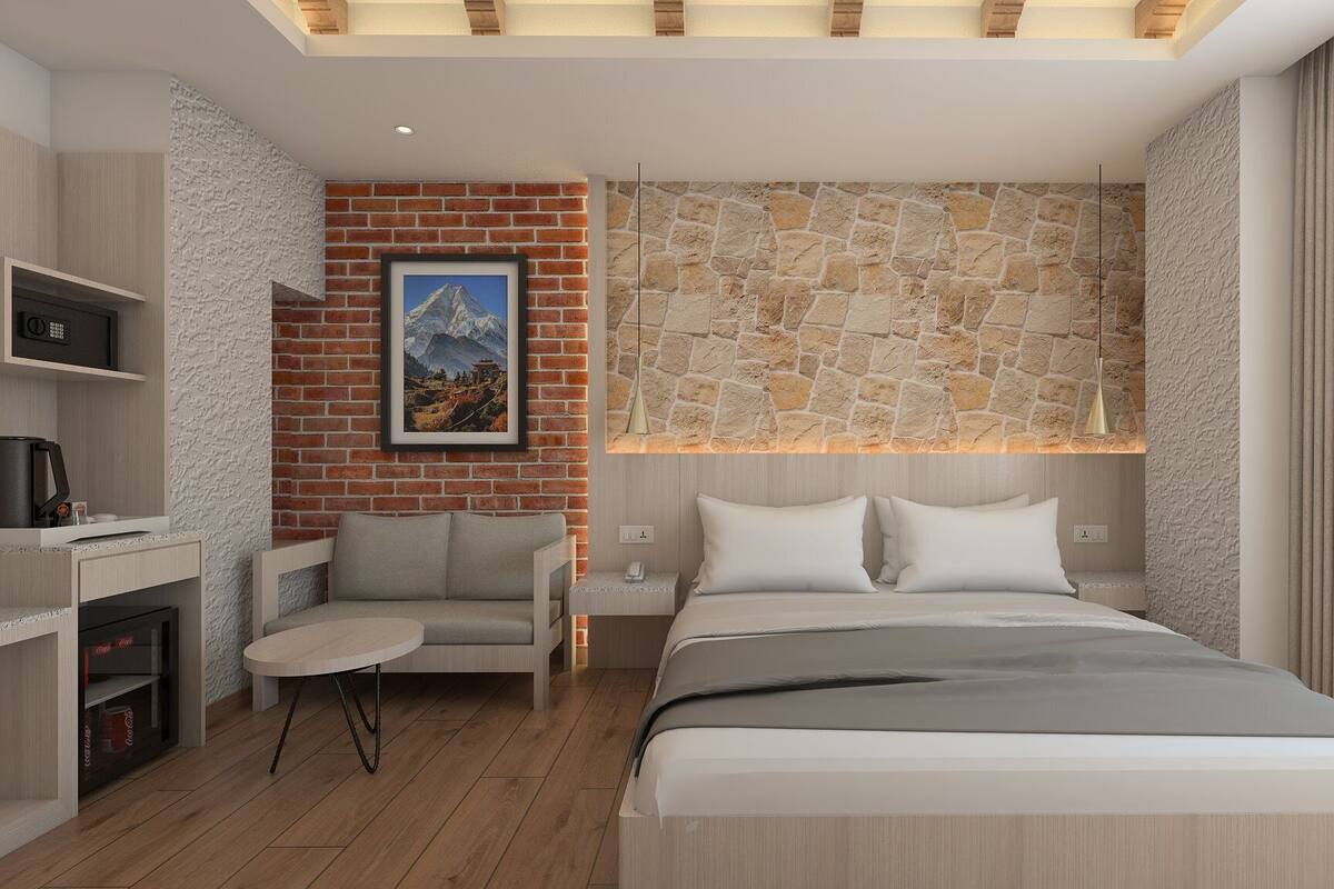 Habitación doble Deluxe | Caja de seguridad en la habitación y escritorio