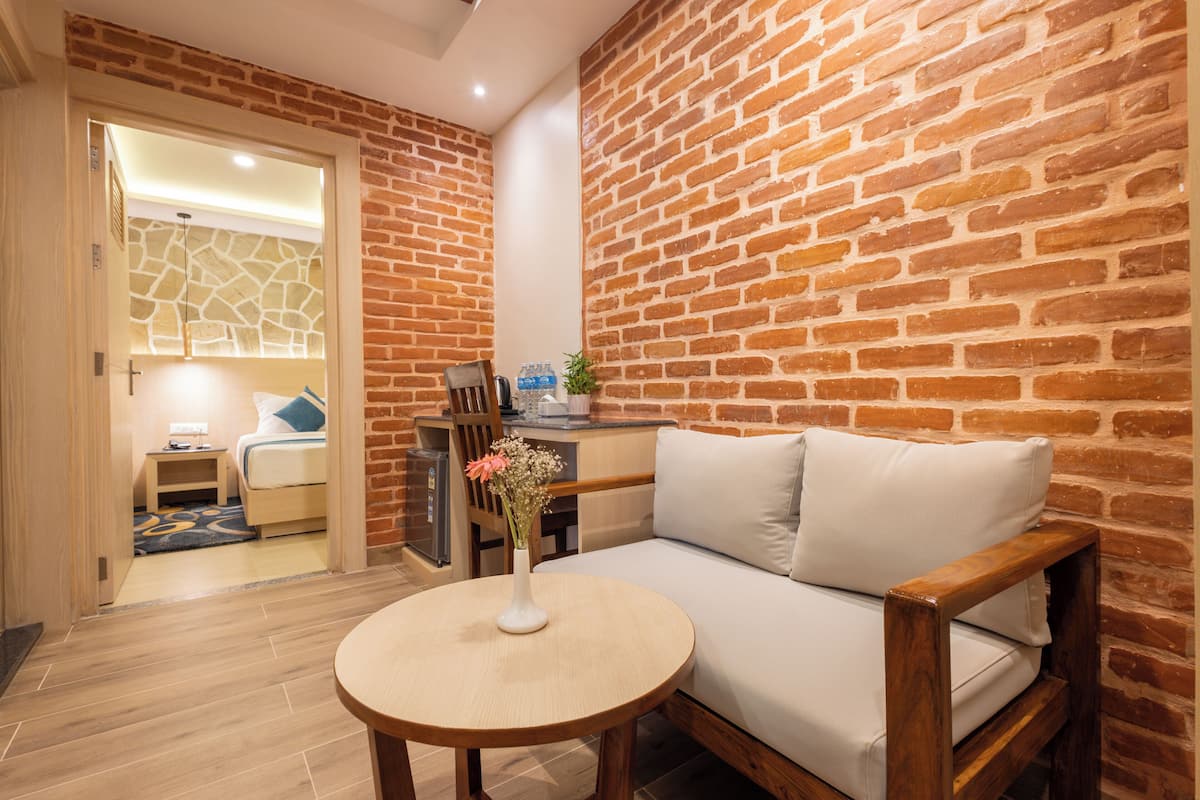 Studio Suite dành cho gia đình | Minibar, két bảo mật tại phòng, bàn 