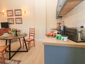 Fridge, toaster, cookware/dishes/utensils