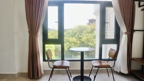 Deluxe Quadruple Room | Free WiFi - Monstera Hotel and Coffee (Phu Quoc)