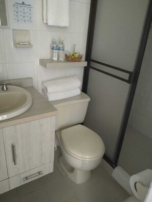 Standard Double Room, Garden View | Bathroom | Shower, towels, toilet paper