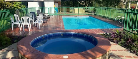 Outdoor pool, pool umbrellas, pool loungers