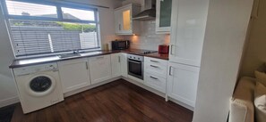 Fridge, oven, stovetop, cookware/dishes/utensils - Cozy 2BDR Home Near Luas 5km to City Centre (Dublin 12)