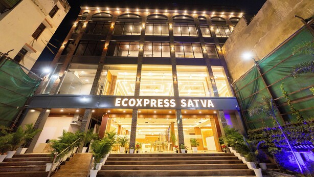 A hotel entrance with a sign reading "ECOEXPRESS SATVA". - EcoXpress Satva Varanasi - Vegetarian with all Options (Varanasi)