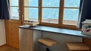 Interior - Outside: Bright and warm apartment, facing south, with furnished terrace and exceptional view of the (St-Luc)