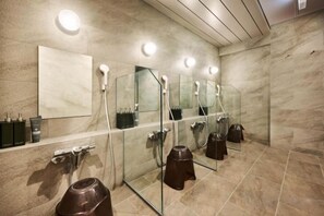 A modern bathroom with multiple sinks, mirrors, and a tiled floor. - NiHITARU Stay (Tokyo)