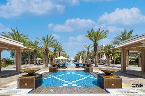 Outdoor pool - Grandeur 2BR Small Room & Beach Access (Dubai)