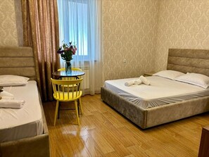 Superior Twin Room, Courtyard View | Desk, laptop workspace, soundproofing, iron/ironing board