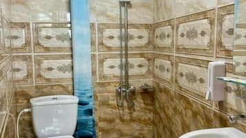 Superior Twin Room, Courtyard View | Bathroom | Free toiletries, hair dryer, slippers, towels