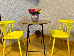 Family Triple Room, Courtyard View | Desk, laptop workspace, soundproofing, iron/ironing board