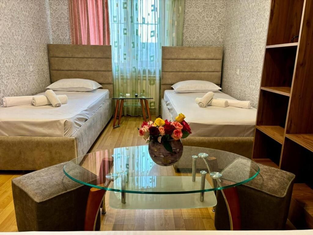 Standard Twin Room, Courtyard View | Desk, laptop workspace, soundproofing, iron/ironing board